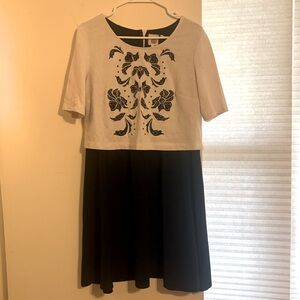 GUC Anthropologie dress with unique embroidered cut out design on front.